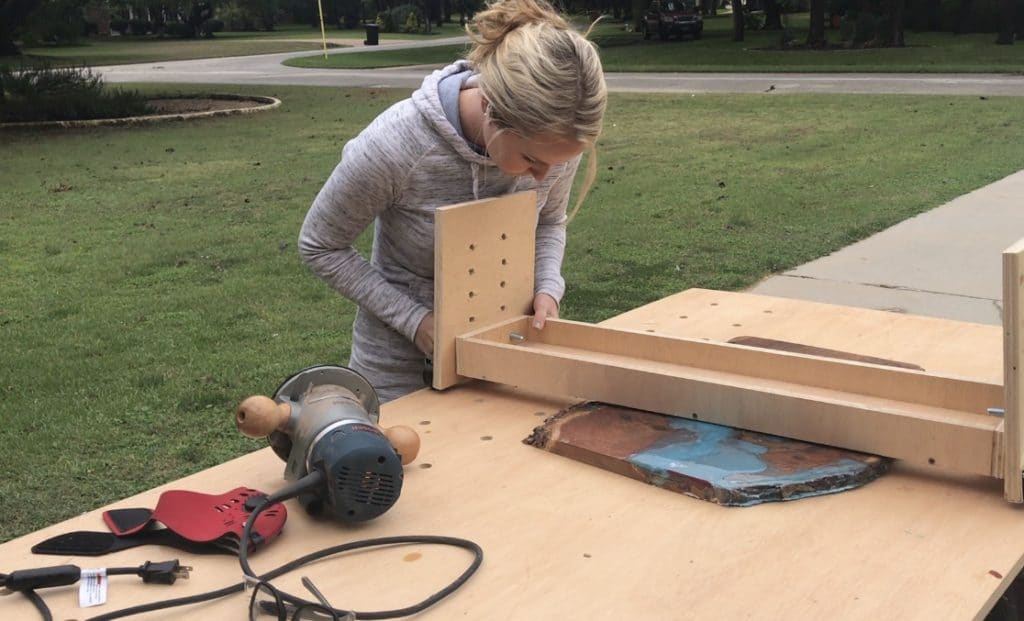 Install bolts to legs for router sled