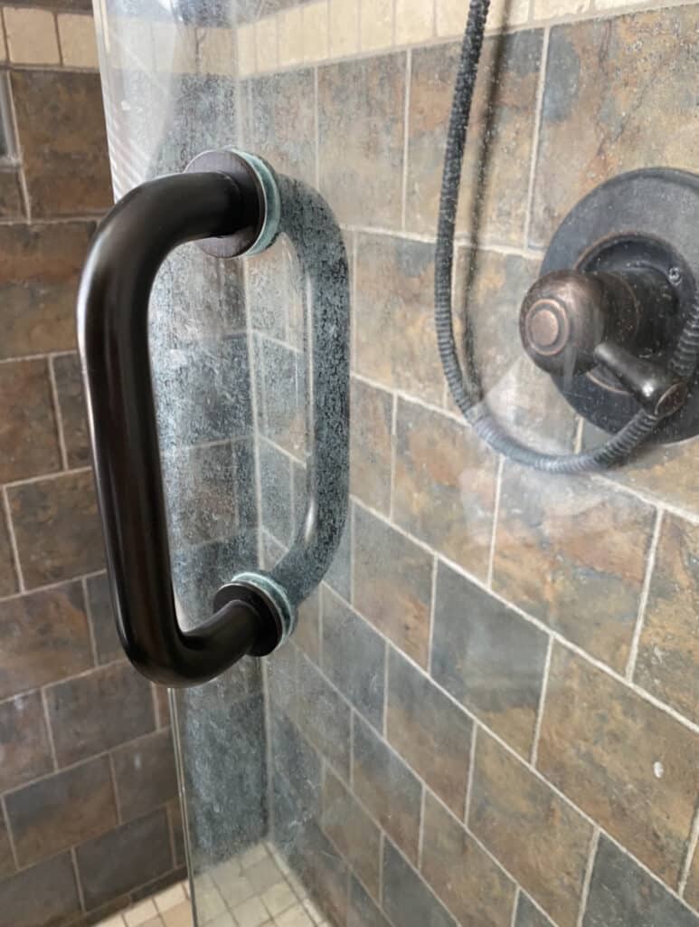 hard water stains on glass shower door