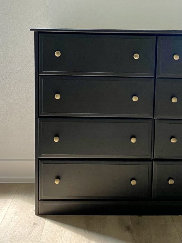 close up of dresser painted black