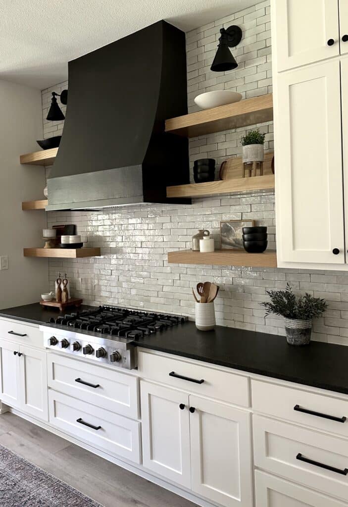 black range hood with open shelves