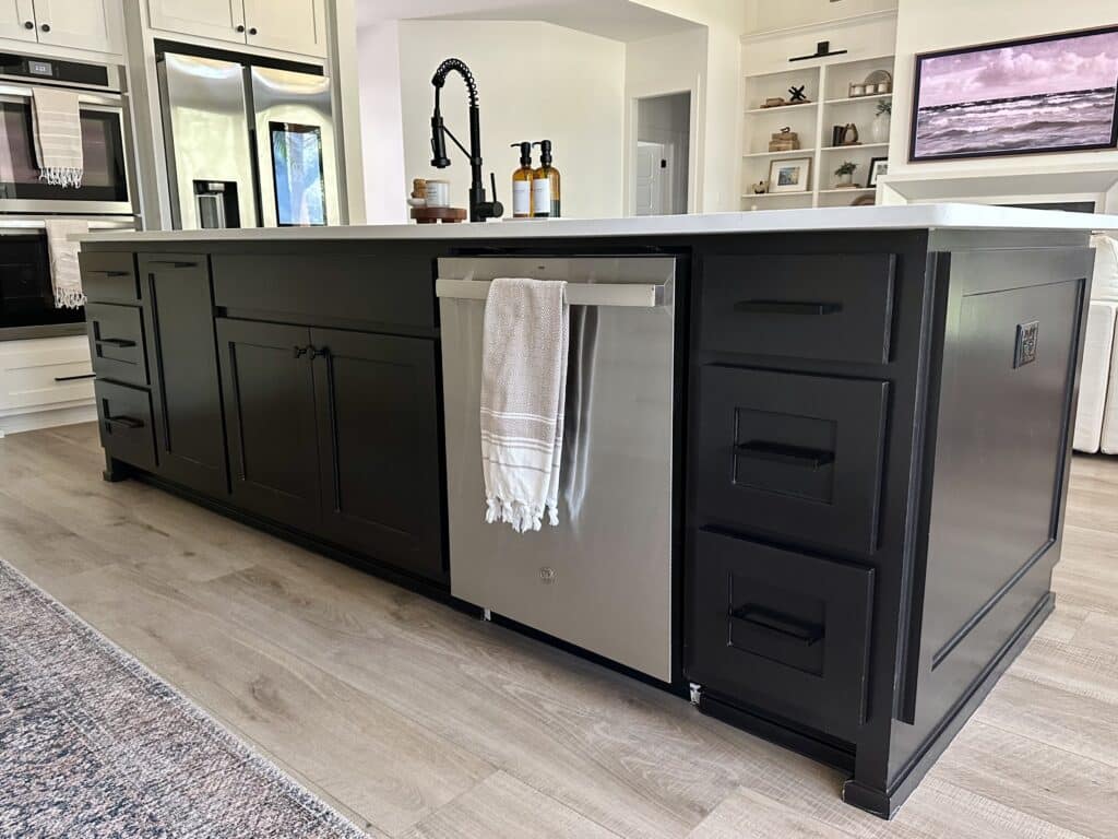 matte black hardware on black shaker style kitchen island cabinet