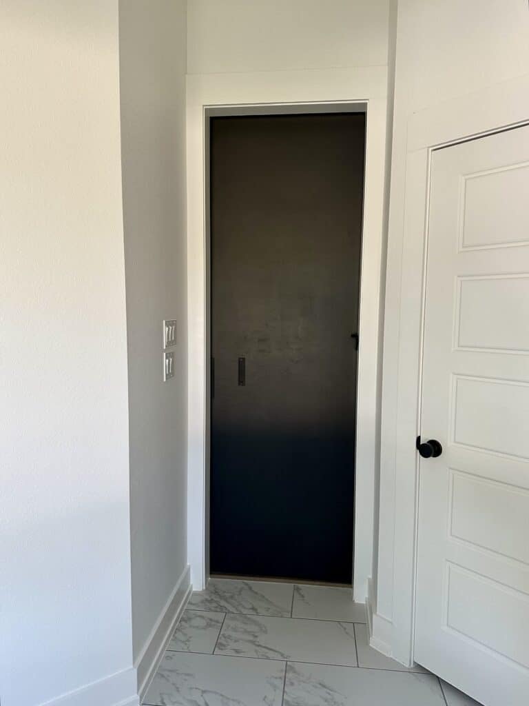 sliding door going into master bedroom from bathroom