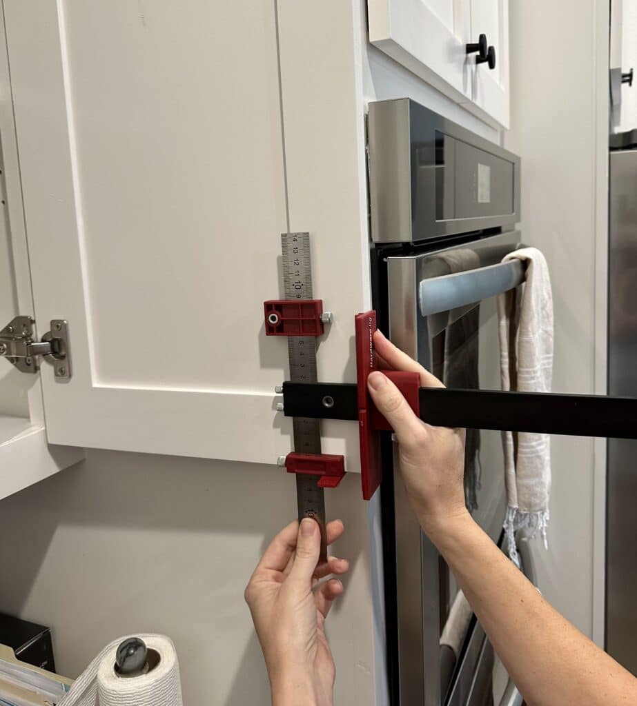 using the hardwarejig for installing knobs on kitchen cabinets